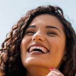 woman with brown hair smiling